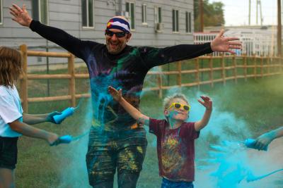 Dad and son color run